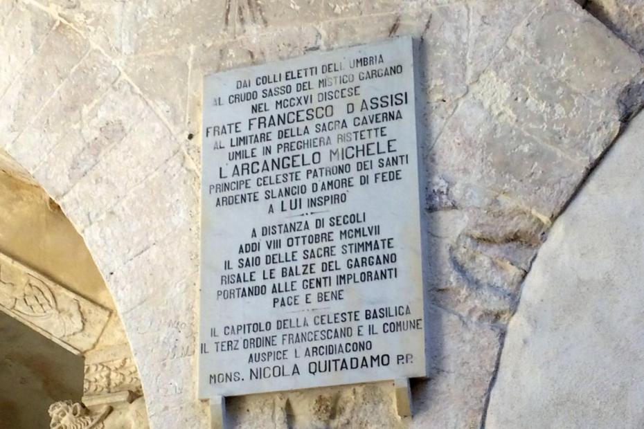 A plaque commemorating a visit of St. Francis of Assisi to the Shrine of San Michele.