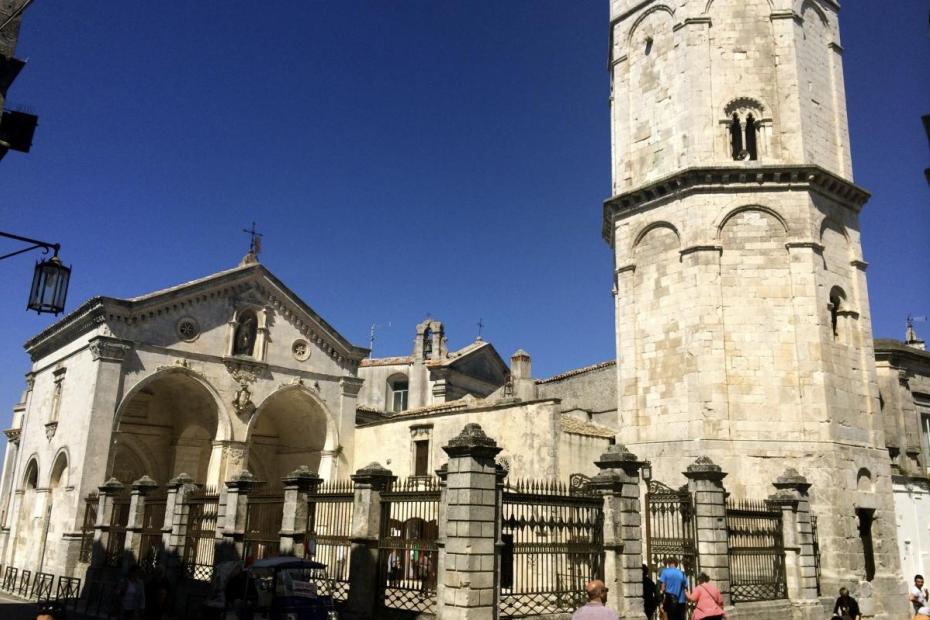 The exterior of the shrine of San Michele the archangel. The cave is down a long series of stairs.