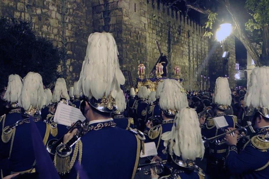 Musicians process with the Confraternity de la O from the cathedral back to their home sanctuary in the early hours of Good Friday.