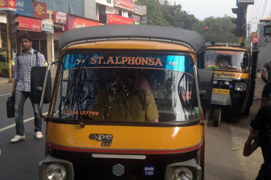 A local "three wheeler" dedicated to the native saint of Kerala.